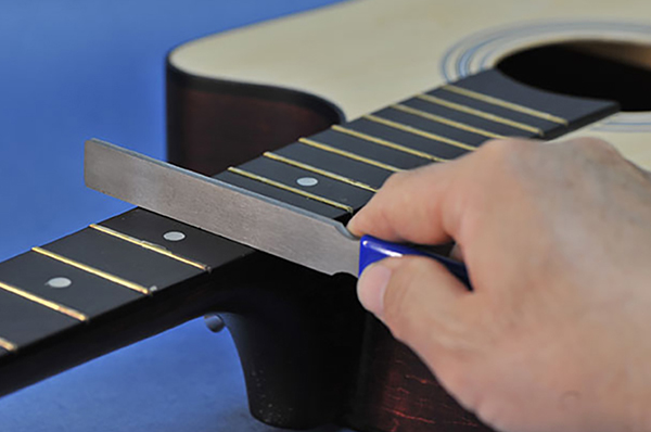 Fret crowning after leveling